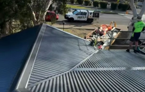 PMR roofer carrying out a metal roof inspection in the Illawarra